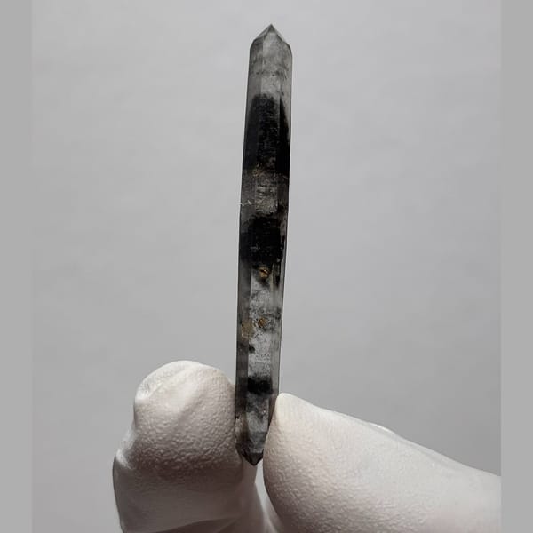 Slender long DT Yunnan quartz — complete view