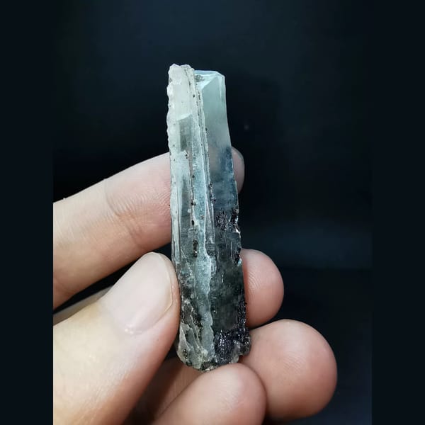 Interference quartz with specular hematite — detail view