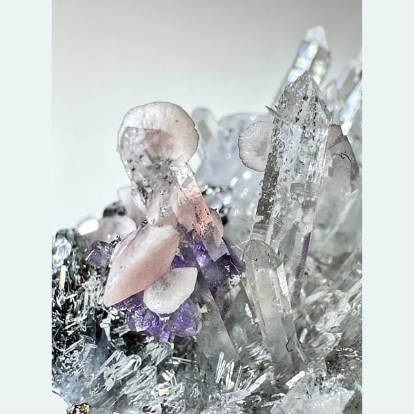 Rhodochrosite with Violet Apatite and Quartz 3.0 cm — detail view