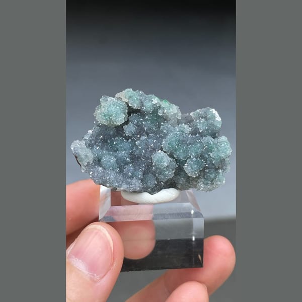 Rounded malachite spheres coated with quartz from the Congo — complete view