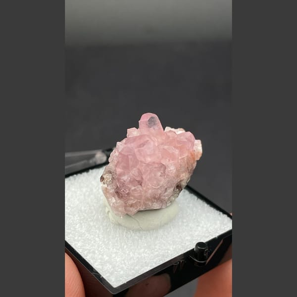 Bright pink cobaltoan calcite crystals from Morocco — alternate view