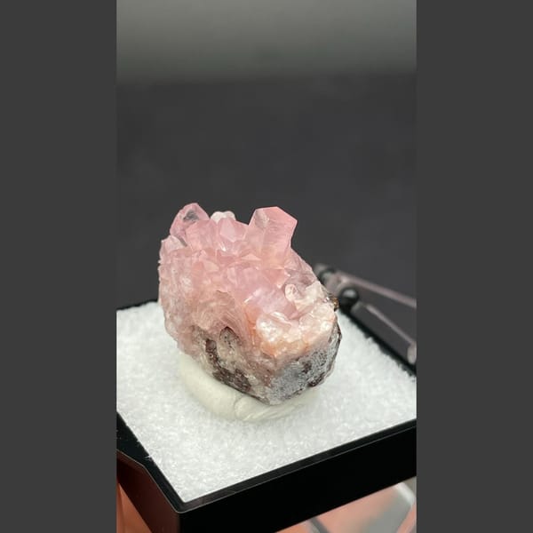 Bright pink cobaltoan calcite crystals from Morocco — alternate view