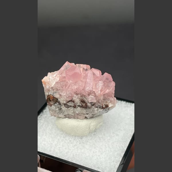 Bright pink cobaltoan calcite crystals from Morocco — detail view