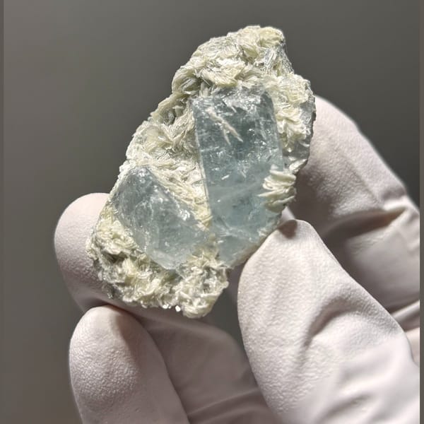 Surface-worn Xuebaoding aquamarine — alternate view
