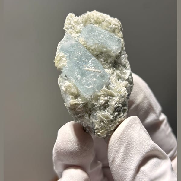 Surface-worn Xuebaoding aquamarine — alternate view