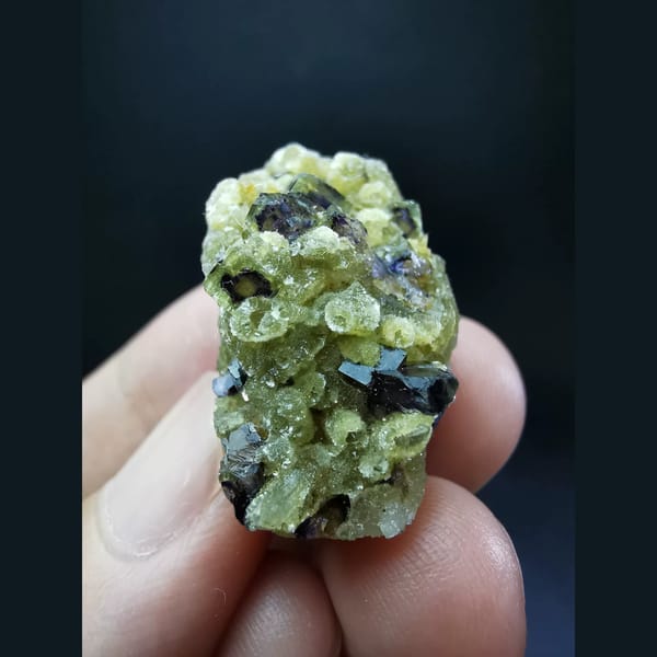 Small purple phantom fluorite on phlogopite — complete view