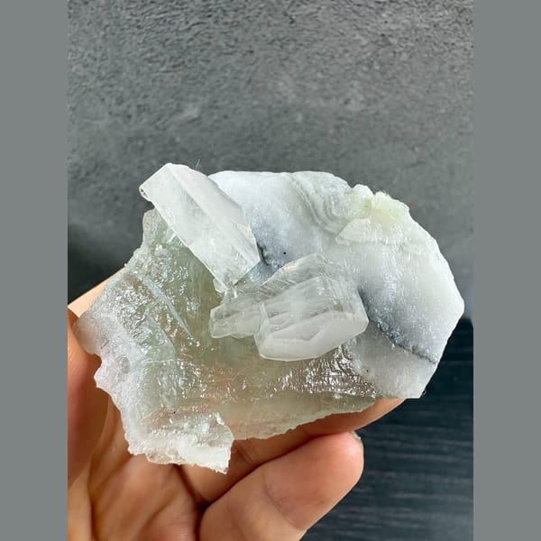 Pale green fluorite with frosted white bladed calcite from Fujian — complete view