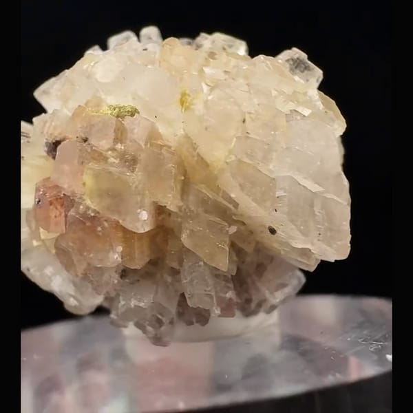 Small round ball of glassy creedite crystals from Guizhou — detail view