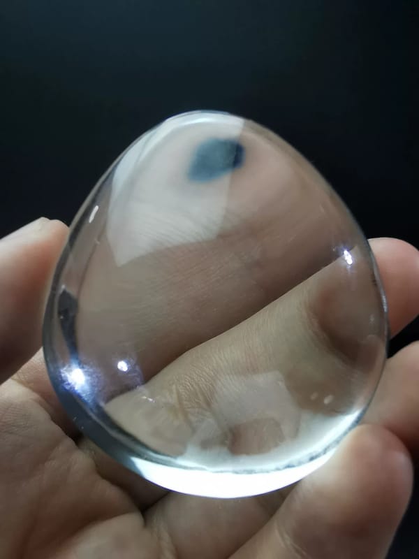 Complete reverse view of the transparent clear quartz palm stone