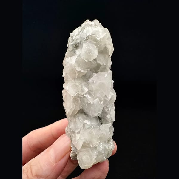 Quartz floater covered in pink and white petal calcite from Inner Mongolia — alternate view