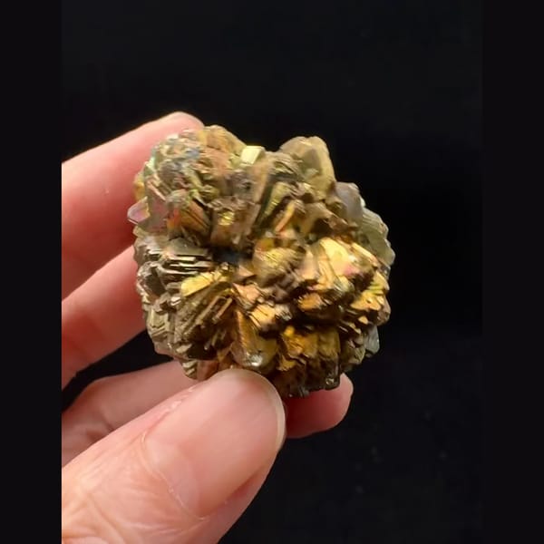 Round pyrite after marcasite ball with iridescent tarnish from Pakistan — alternate view
