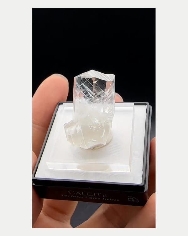 Complete left oblique view of clear calcite crystal