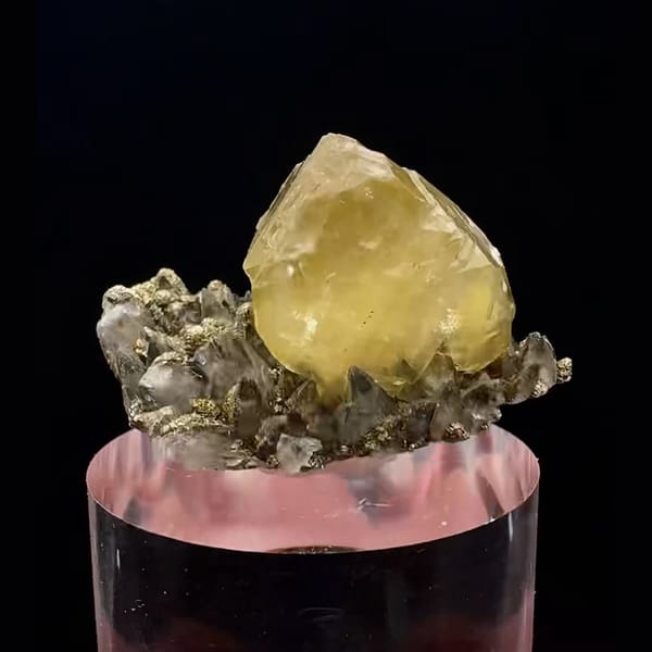 Lemon-yellow calcite crystal on pyrite and quartz from Daye, Hubei — alternate view