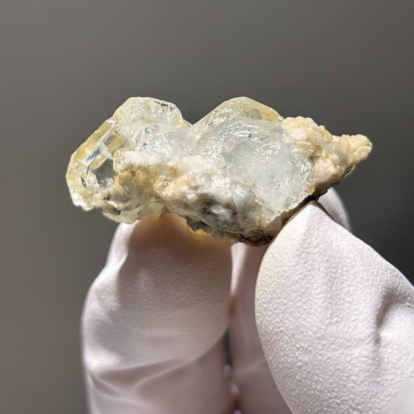 Xuebaoding aquamarine with feldspar — alternate view