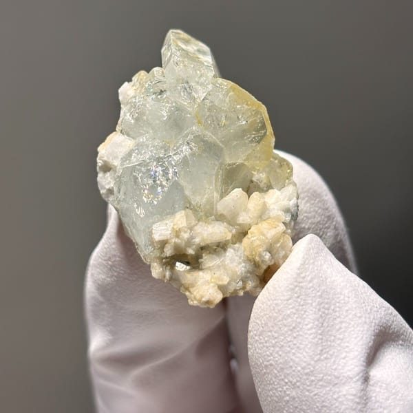Xuebaoding aquamarine with feldspar — detail view