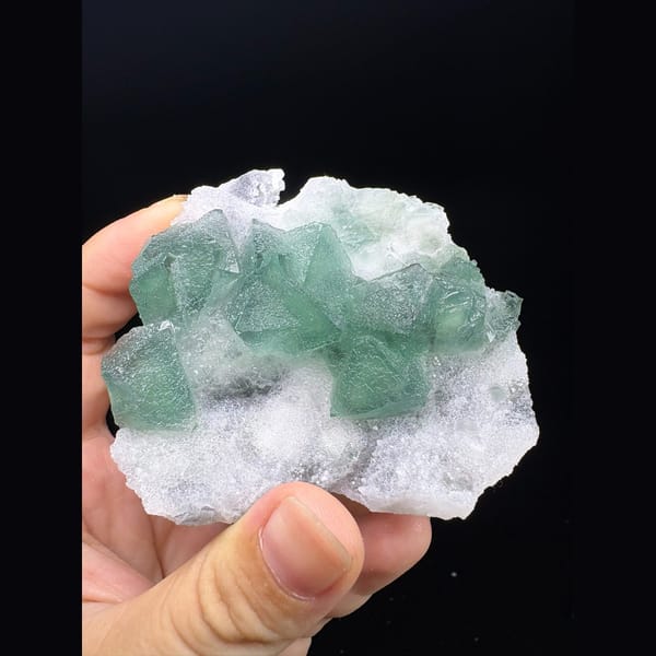 Green fluorite crystals on white sugary matrix from Fujian — complete view