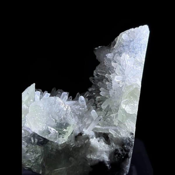 Green fluorite with needle quartz from Jiangle — detail view