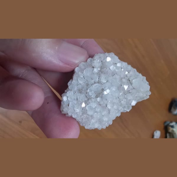 Three sparkling apophyllite pieces — alternate view