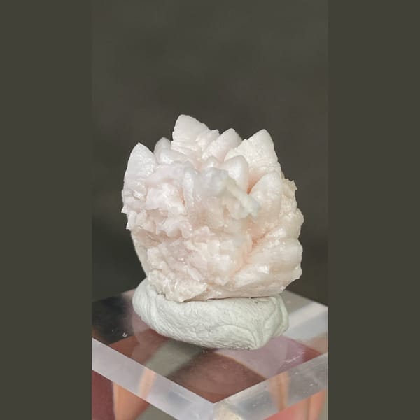 Pale pink dogtooth manganoan calcite rosette from Bulgaria — detail view