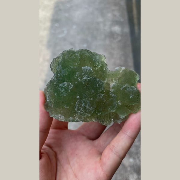Large glassy apple-green stepped fluorite from Henan — detail view