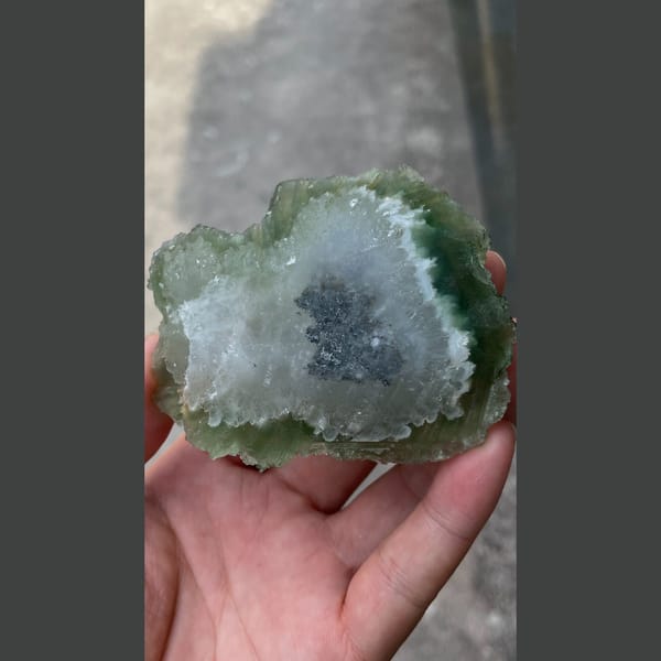 Large glassy apple-green stepped fluorite from Henan — detail view