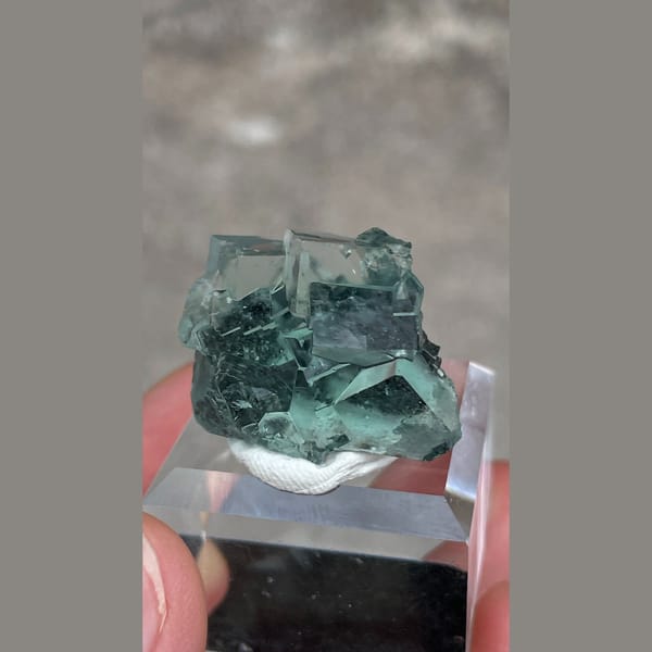 Transparent teal-green fluorite with wispy inclusions from Hunan — alternate view