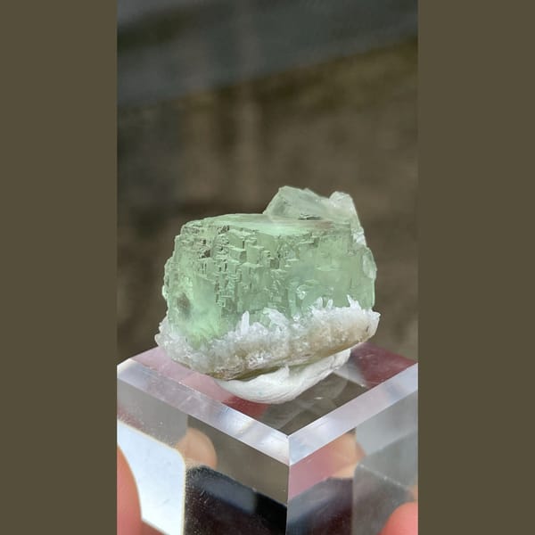 Pale mint-green stepped fluorite crystal from Fujian — alternate view