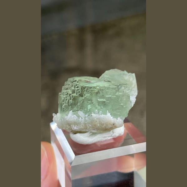 Pale mint-green stepped fluorite crystal from Fujian — alternate view