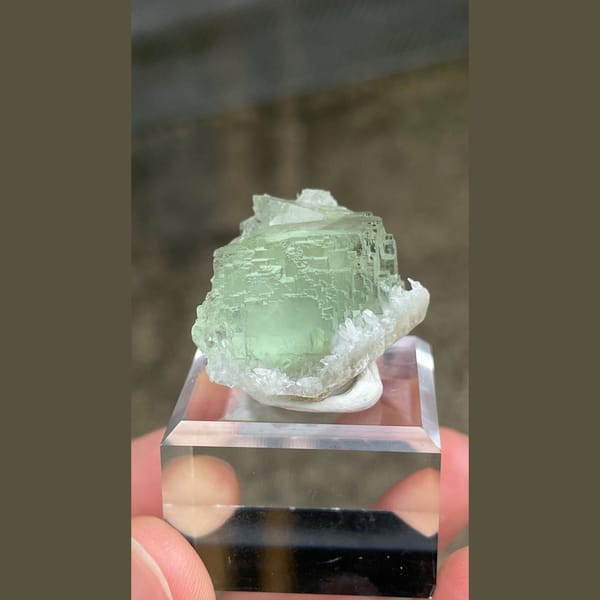 Pale mint-green stepped fluorite crystal from Fujian — detail view