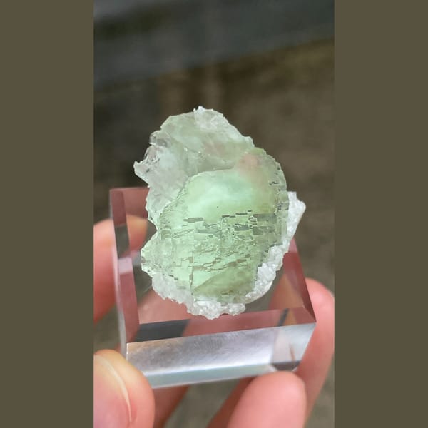 Pale mint-green stepped fluorite crystal from Fujian — detail view