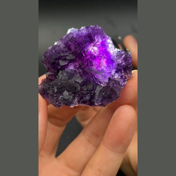 Deep purple stepped fluorite cluster from Henan — complete view