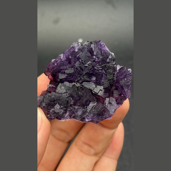 Deep purple stepped fluorite cluster from Henan — detail view