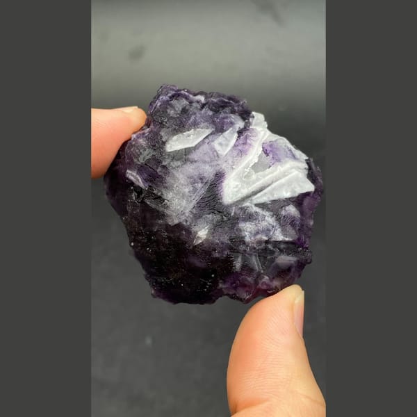 Deep purple stepped fluorite cluster from Henan — detail view