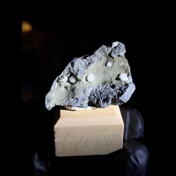 Calcite balls on zeolite and basalt from Vietnam — complete view