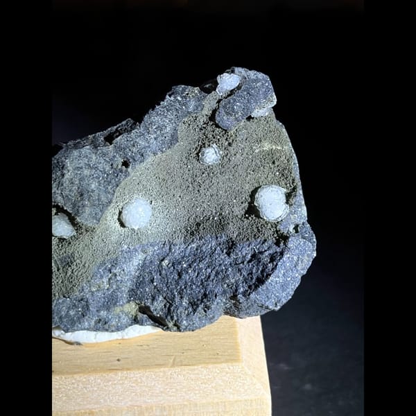 Calcite balls on zeolite and basalt from Vietnam — alternate view