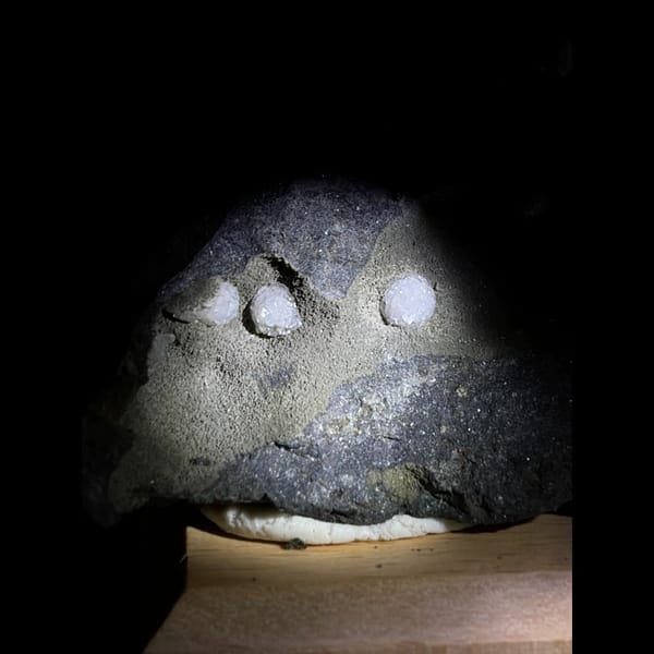 Calcite balls on zeolite and basalt from Vietnam — alternate view