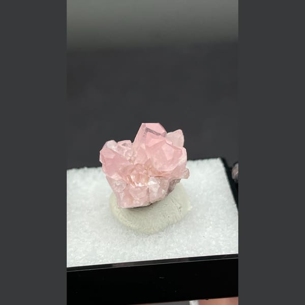 Small cluster of pink cobaltoan calcite crystals from Morocco — detail view