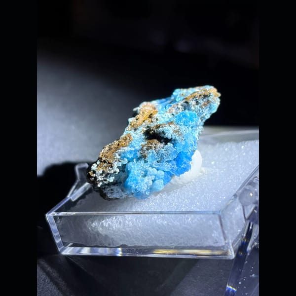 Sky blue botryoidal gibbsite on limonite — detail view