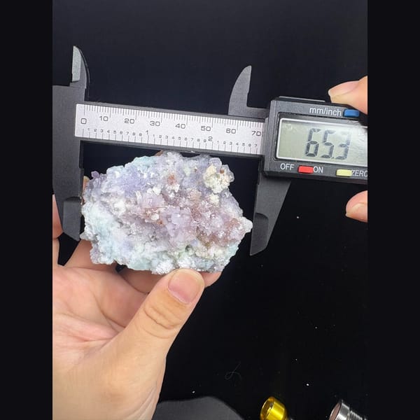 Pastel purple creedite with white gypsum from Qinglong — detail view