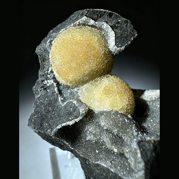 Yellow Calcite Spheres in Basalt Pocket Vietnam 7.0 cm — complete view