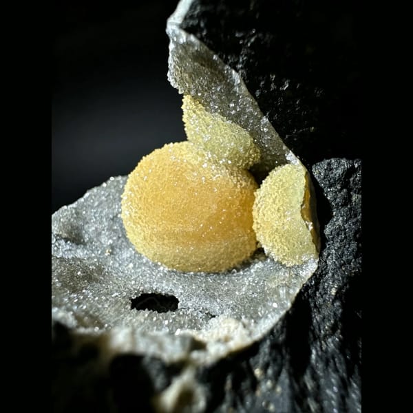 Yellow Calcite Spheres in Basalt Pocket Vietnam 7.0 cm — alternate view