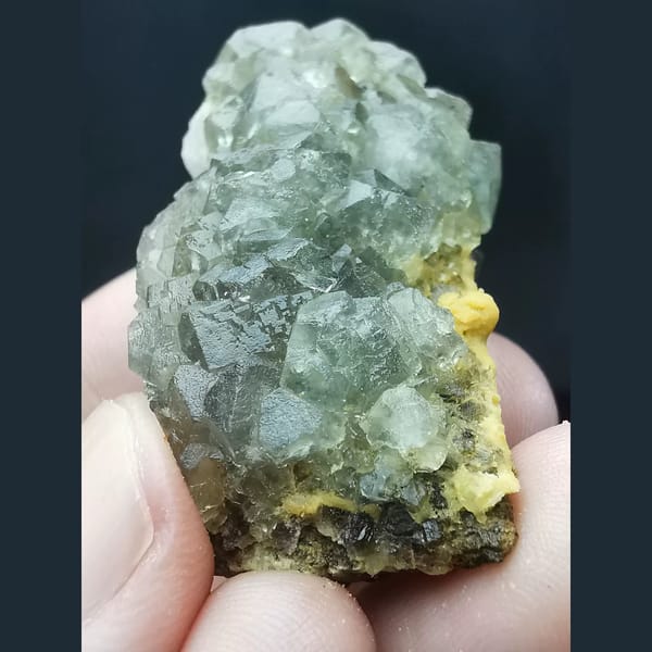 Pale green combined-form fluorite cluster — detail view