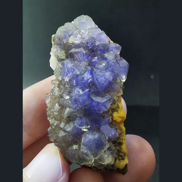 Pale green combined-form fluorite cluster — detail view