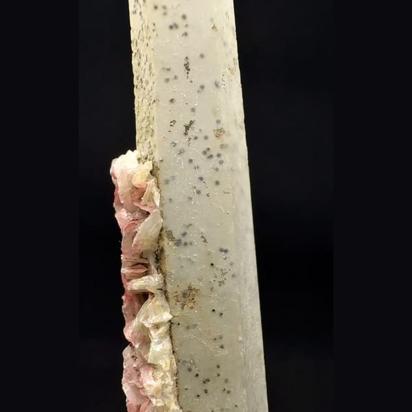 Long frosted quartz crystal with red bladed calcite from Inner Mongolia — detail view