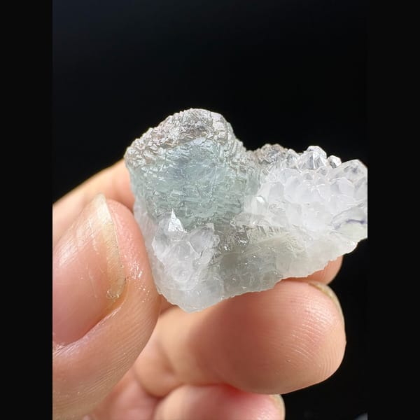 Small stepped octahedral fluorite with a blue core and quartz from Fujian — complete view