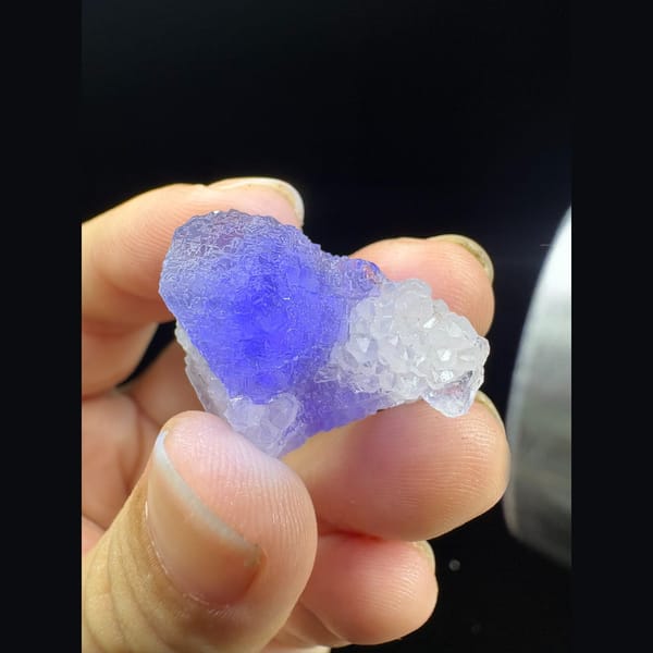 Small stepped octahedral fluorite with a blue core and quartz from Fujian — alternate view