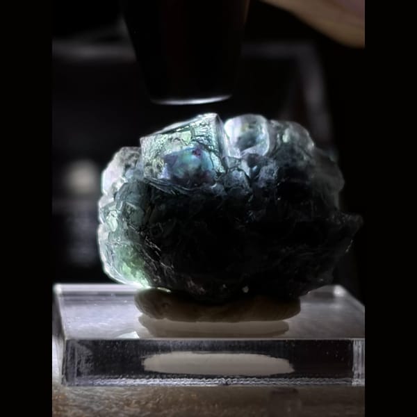 Smoky blue-grey Alien Eye fluorite — detail view