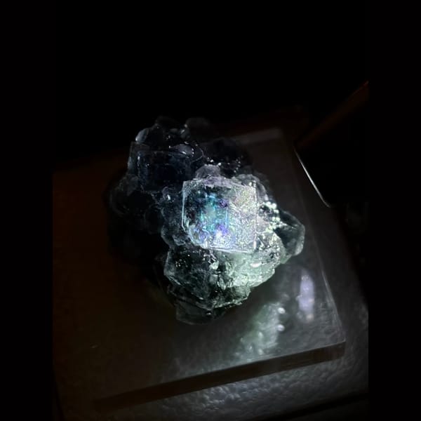 Smoky blue-grey Alien Eye fluorite — detail view