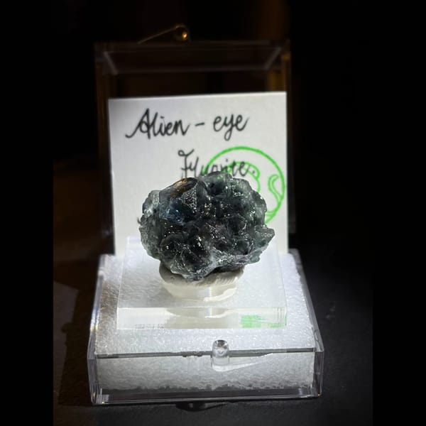 Smoky blue-grey Alien Eye fluorite — detail view