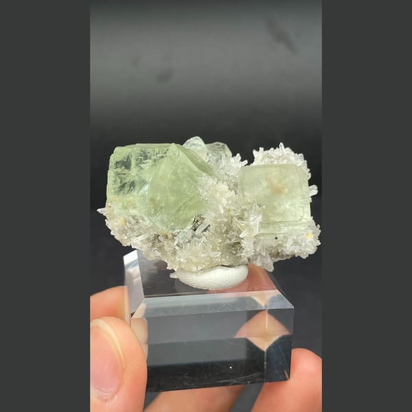 Icy pale green fluorite cubes with white quartz from Fujian — alternate view